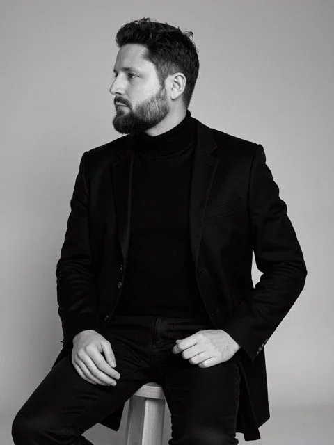 Ilya Gerasimets, founder of Linguallogy, in a studio portrait